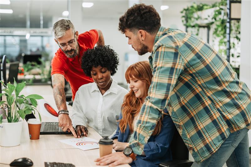 Group of creative people working together in a project